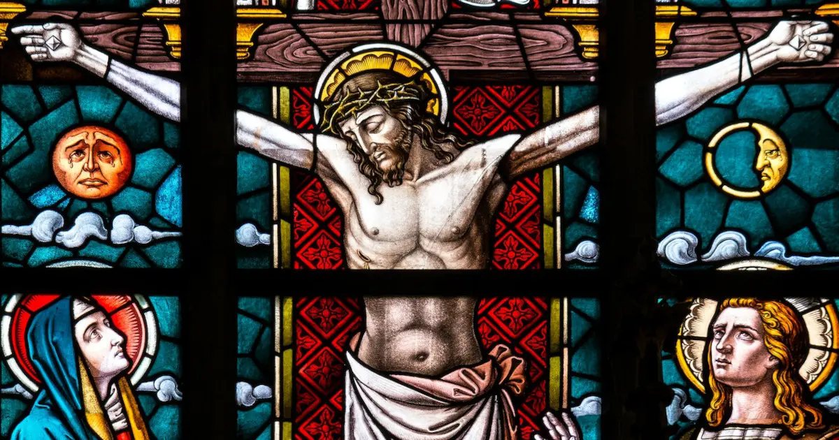 A stained glass of Jesus Christ on the cross